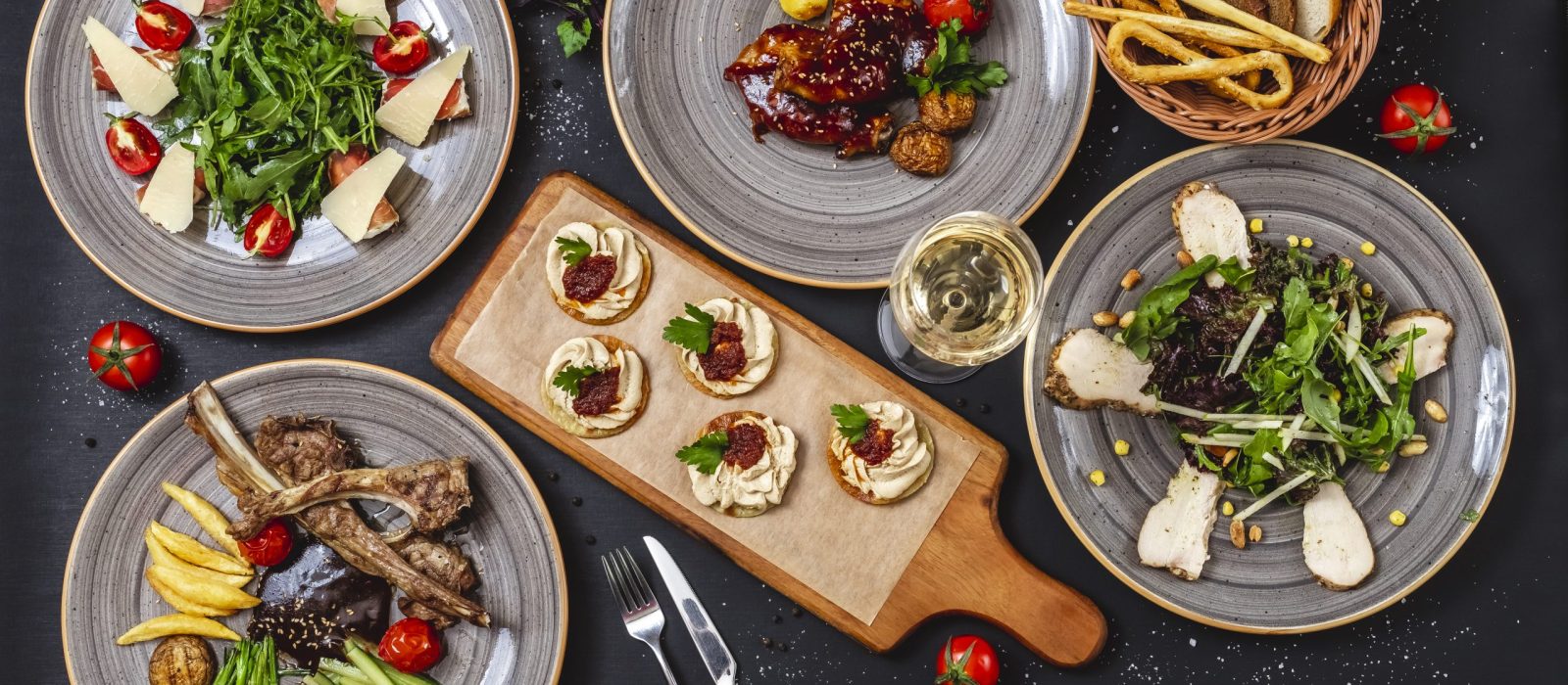 top view fast food mix grilled lamb meat cucumber tomato french fries arugula salad with salmon and parmesan cheese grilled chicken breast with fresh greens bread bas